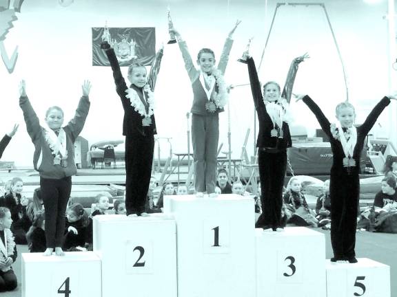 Giant gymnasts win medals in Florida Megan Ward of Fredon takes first place all around.