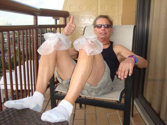 Locals go a little Dopey for Disney World races Joseph Farinella ices his knees after racing.