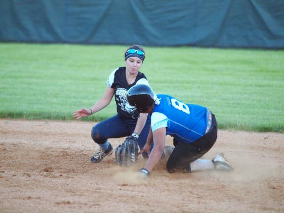 Wallkill Valley's Ariel Milligan slides and beats the tag from Sussex Tech's Emma Noury at second base.