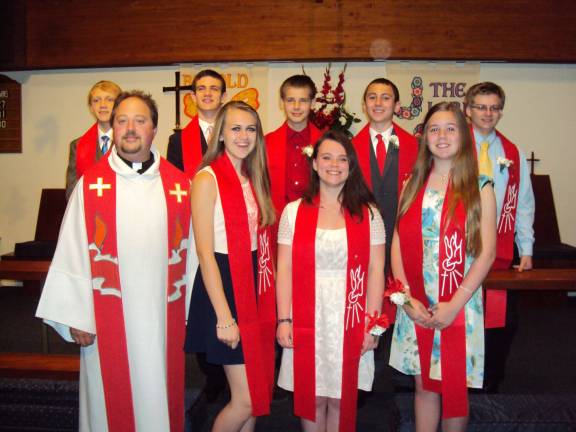 Recently, eight young adults celebrated the rite of Confirmation at Holy Counselor Lutheran Church, in Vernon. Pictured here in the back row, from left,, William Wiik, Eric Loughren, Garrett Cobb, Joseph Ionta, and Justin Duryea. Front row, from left, Pastor Bruesehoff, Kailyn Schofield, Olivia Monahan and Christine Birkland.