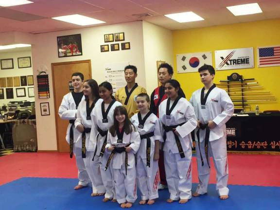 Seven new black belts in Taekwondo