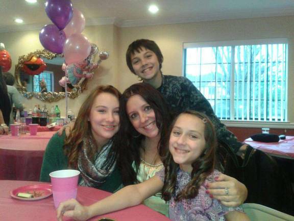 Dawn Fantasia of Franklin and her three children, Maria Margot (15), Aidan (13), and Lila Claire (11).