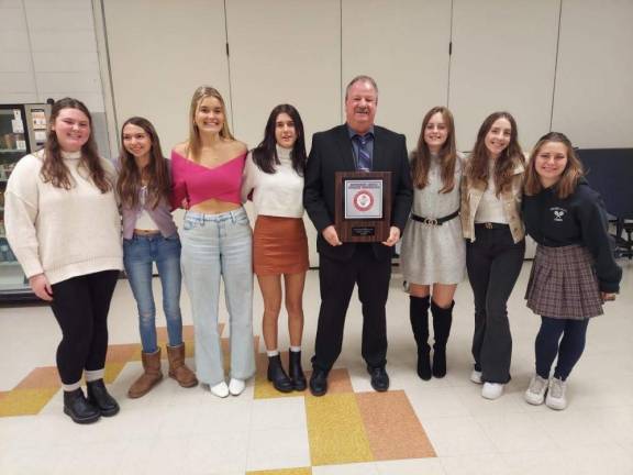 Wallkill Valley Girls Tennis team wins division The Wallkill Valley Girls Tennis team finished their season 11-1, winning their division. Pictured from left to right are: Hannah Posser, Katherine Fluhr, Emily Carey, Claire Kornak, Coach Hornyak, Kaylyn Bowden, Nicole DeFinis, Dayna Alemy. Photo provided.