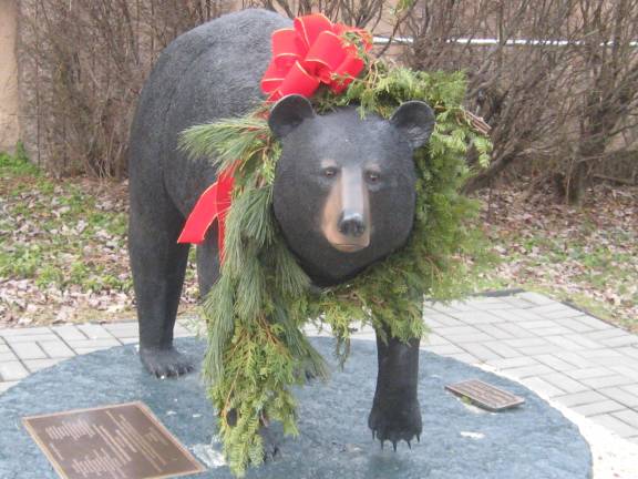 Even Vernon's honorary bear Samantha sports her holiday best.