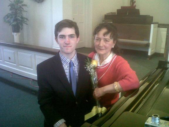 Pope John student earns piano scholarship Ryan Fieldhouse is shown with piano instructor Margaret Korczynski.