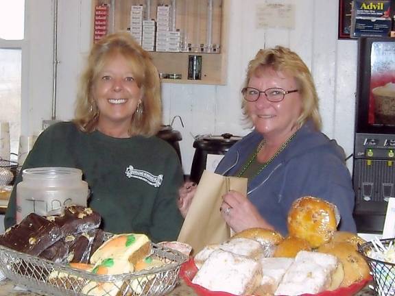 Mary and Loretta man the counter at the deli.