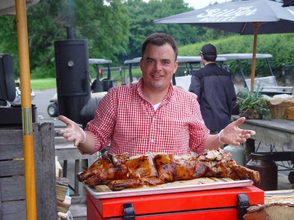 Big Bear Golf Club hosts BIG Friday Golfers at Black Bear BIG Friday enjoyed a fresh roasted pig along presented by Tom Roche on the Black Bear food and beverage staff.