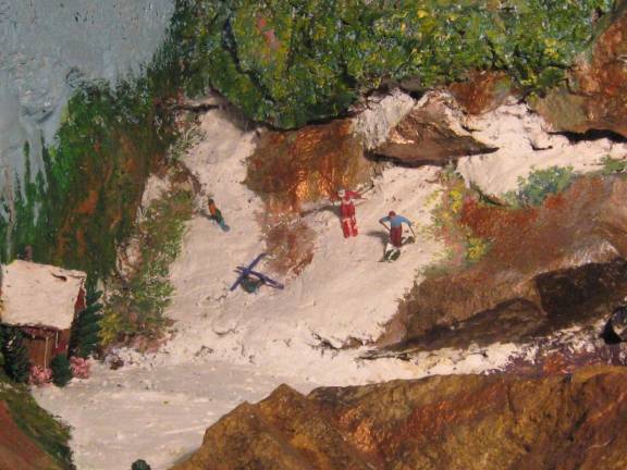Highland Lakes resident creates rock mural Spring skiing is featured on one side of the rock.