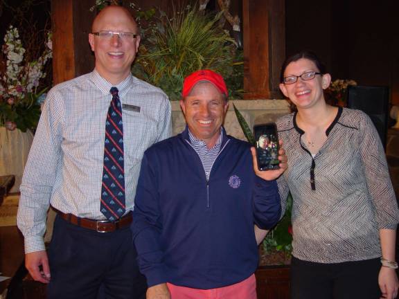Men&#xfe;&#xc4;&#xf4;s Division Winners Anthony Fioretti and Randy Halat (picture on phone) with CS GM Adam Donlin &amp; Katie Levins