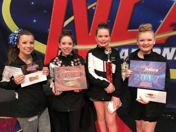 Pizazz students succeed at competitions The regional champion winners (Amanda Mudrick, Devan Meggiolaro, Talia Greenwood & Katie Molini.