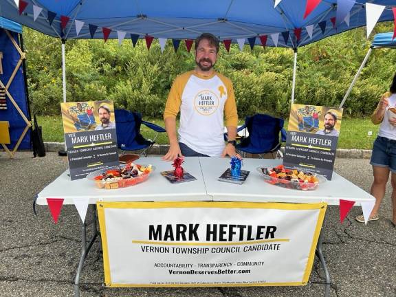 Township Council candidate Mark Heftler did some campaigning at the street fair.