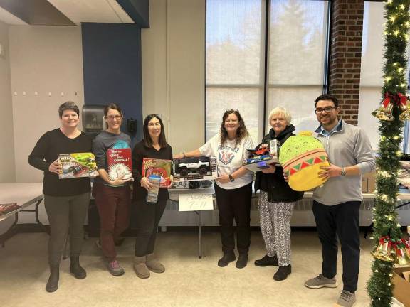 From left are Jennifer Emmitt, Jessica Clarke, Karen Zilinski, Karen Reinersten, Sandy Mitchell and Anthony Graci.