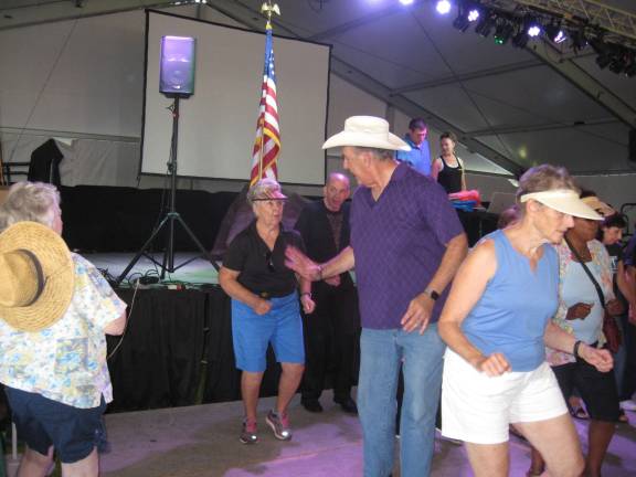 Line dancers step it up Thursday, Aug. 10, at the New Jersey State Fair/ Sussex County Farm and Horse Show.