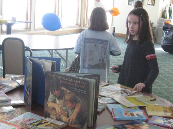 Highland Lakes hosts winter carnival The Book Swap helped children with their winter reading.