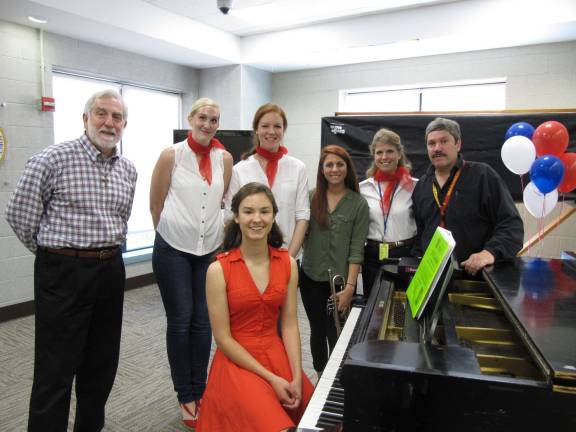Vernon student, teacher play for veterans From the left: Chris Brune, Elizabeth Elorza, Katie Matheson, Megan Novak, Kristen Stewart, Martin Gomes and Maya by the piano.