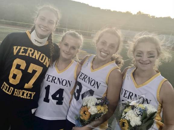 Seniors, from left, Alice Beutel, Hannah VanBlarcom, Haley DeBonta, and Carlie Van Tassel.