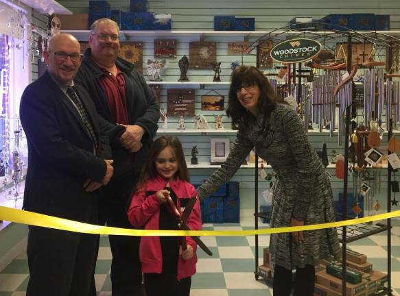The Grand Opening celebration of Rainbow Reflections by Rita located in the Colonial Plaza on Route 94 in McAfee. Mayor Harry Shortway and Councilman John Auberger were on hand while Rita and Miss Riley did the honor of cutting the ribbon.