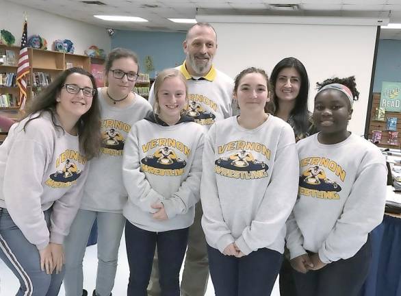 From left, Gianna DeRosa, Hannah Vince, Skye Ivancich, coach Todd Piontkowski, Madison MacPherson, Karen D'Avino, Patience Hevi.