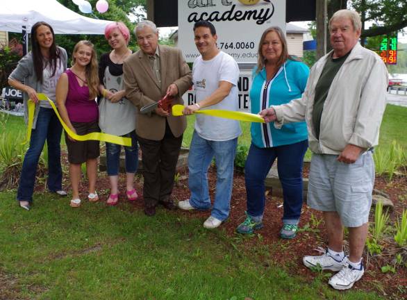 Assisting with the ribbon cutting at Highland Lakes&#xfe;&#xc4;&#xf4; Art Academy were, from left, Vernon&#xfe;&#xc4;&#xf4;s Recreation Director Melissa Wiedbrauk, art teachers Amy Plocharczyk and Bobbi VanEtten, Township Council President Patrick Rizzuto, Art Academy co-owner Michael Accardi, Barbara Gray representing the Vernon Chamber of Commerce, and Councilman Dick Wetzel.