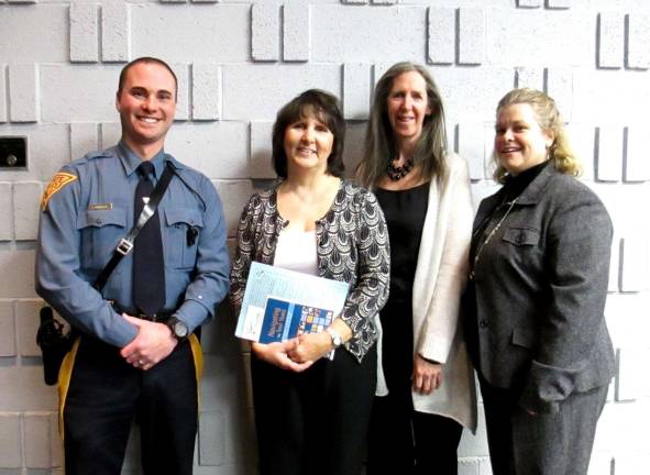 Photo by Viktoria-Leigh Wagner Trooper Jim Bambara, Assistant Director at the Center for Prevention and Counseling Becky Carlson and High Point Substance Abuse Coordinator are shown.