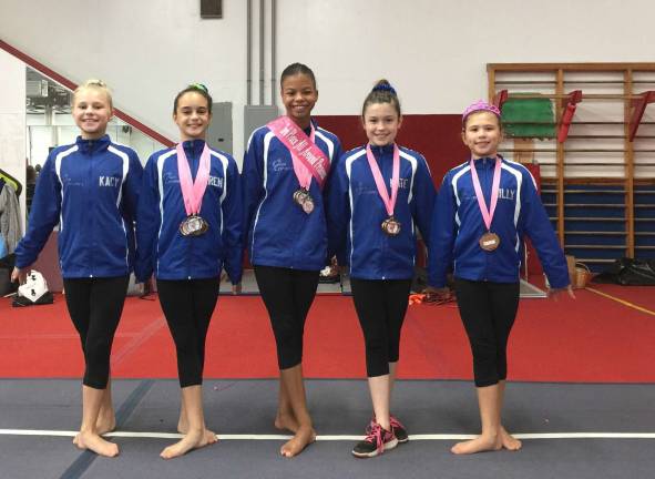 Giant Gymnastics opens the season Kacy Biddiscombe, Karen Maasback, Lily Kucks, Kate Sutphen and Milly Dobbs after the Princess Invitiational.