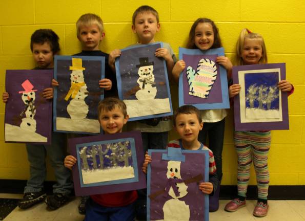 Pictured are some of the student artists showing off their masterpieces - Azraelle, Luke, Kayli, Michael, Andrew, Brody and Dusty.