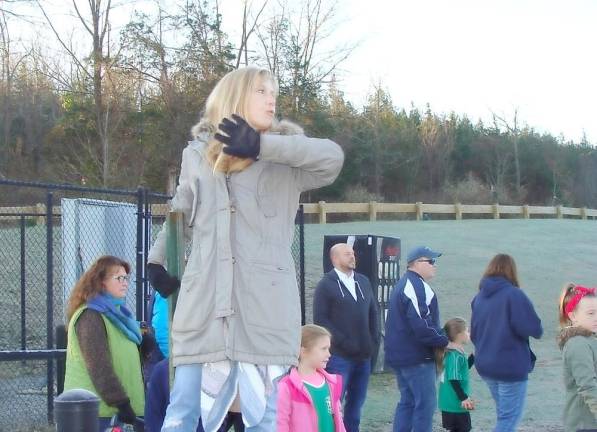 Vernon Recreation Director Mishelle Downtain introduces the new fields and town officials waiting to cut the ceremonial ribbon.