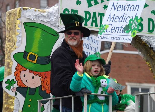 The Newton Medical Center float passes down Moran Street at the 12th Annual Sussex County St. Patrick&#xfe;&#xc4;&#xf4;s Day Parade.