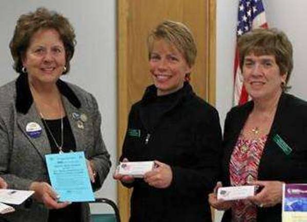 Speaker visits Vernon Woman's Club Vernon Township Woman's Club President Judy Filippini, right, and First Vice President Lisa Mills, center, join Marjorie Strohsahl following her presentation about the programs and services offered by the National Alliance on Mental Illness.