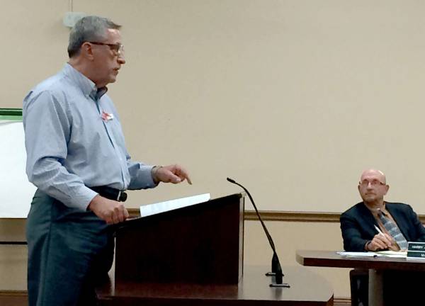 Photo by Diana Goovaerts Former Mayor Victor Marotta speaks to the Township Council on Monday as Mayor Harry Shortway listens.