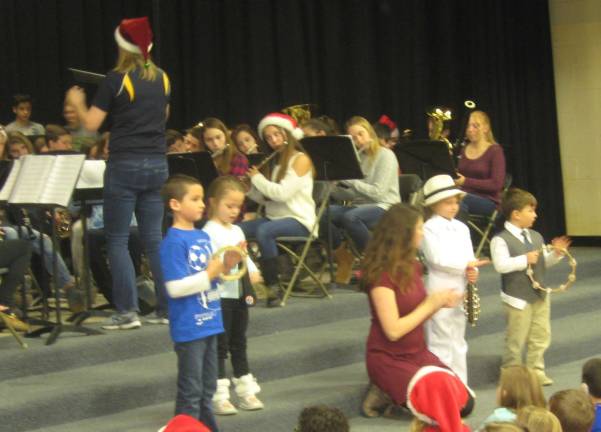 The Glen Meadow Band performs with a little help from Cedar Mountain students and some sleigh bells.