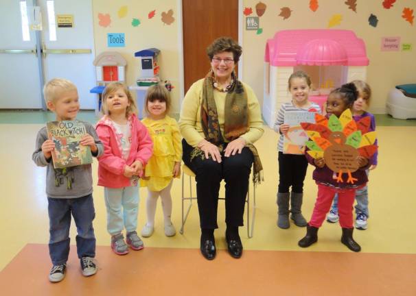 Judge reads books to students Judge Lorraine Parker with the students are Little Sprouts Early Learning Center.