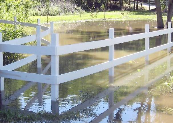 Front lawns turned into lakes on Lazier Lane and Highland Lakes Road on Thursday, Sept. 2 (Photo by Janet Redyke)