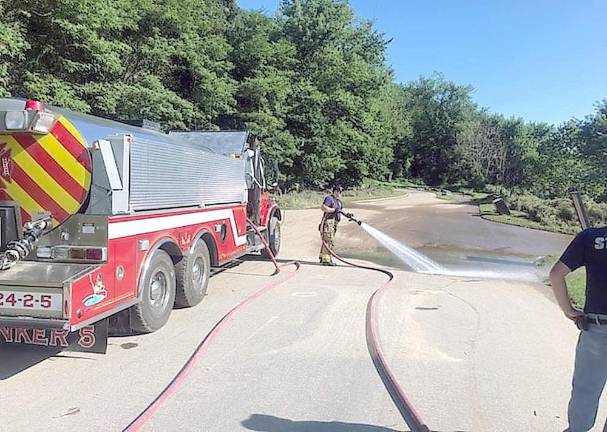 An open and shut case for the park after Ida Firefighters from Bushkill Volunteer Fire Company, Station 24, help clean up after Hurricane Ida (NPS Photo/T. Roessner)