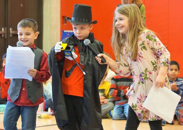 Cedar Mountain students show their talents In center, Billy causes the ball to disappear, with Frankie and Leah on either side.