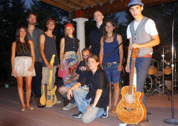 Friends of Library hosts musical talent show Standing, from left: JaiMe D'Angelo, Christian Hollis, Tyler Goodyear, Emma, Joe Lombardo, Melissa Lucciola, and Micah Freire. Kneeling: Don Rattino and Marcel LaMorte.