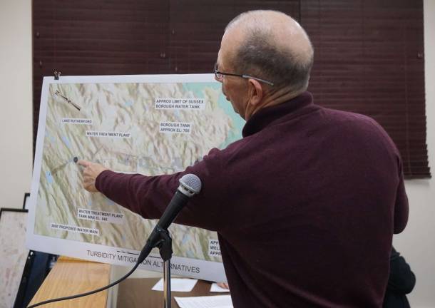 PHOTO BY VERA OLINSKI Sussex Borough Utility Manager Gerald Gardner explains the water turbidity solutions.