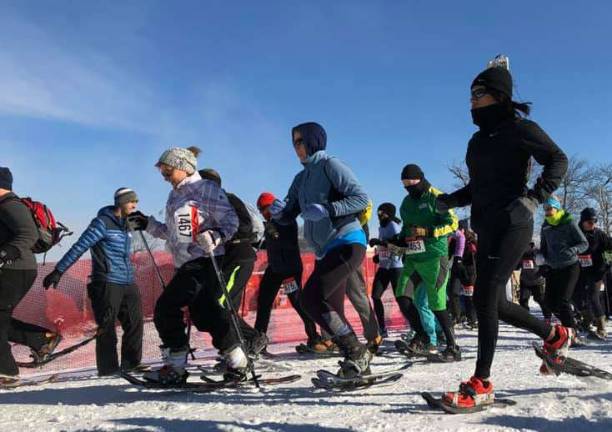 Vernon hosts snowshoe invasion The start line.