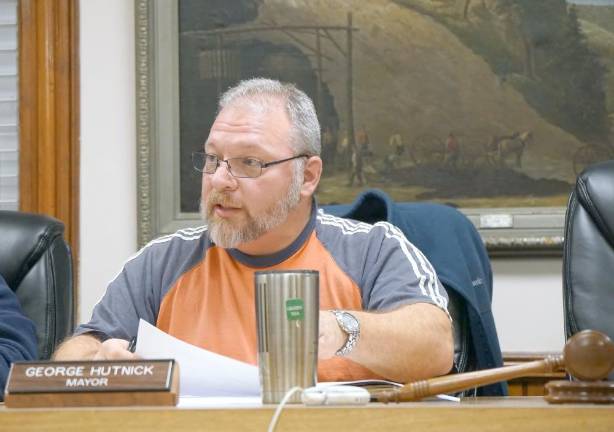 Mayor George Hutnick at an Ogdensburg Council meeting in January. The council adopted the 2020 budget via conference call on Monday.