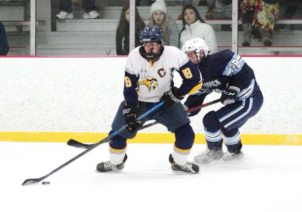 Vernon's Jack Bokun is in control of the puck in the second period. Bokun scored one goal and made two assists.
