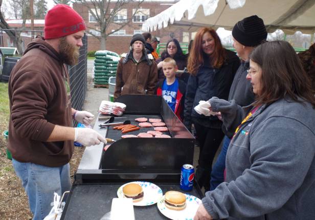 Free hot dogs and hamburgers were available.