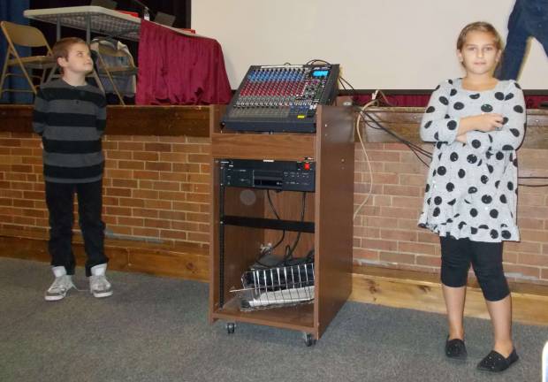 Photo by Vera Olinski Hunter and Kaitlyn, fourth-grade students, give a coding presentation at the Sussex-Wantage Regional School District Board of Education meeting on Nov. 17.