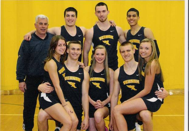 Vernon track and field coach recently completed his final season before retirement. He is picured in back at left. Also picture is back from left, Morgan Murphy, Tyler Schutz and Brandon Clark; front from left, Desiree Derella, Luke Venskus, Samantha Stevens, Jared Ryder and Sierra Marchesin