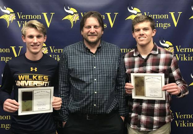 Senior Mid-fielder Adam Hazell, Head Coach Joe Jones and Junior Goal-Keeper Ryan Lalley are pictured. Adam received All State Honorable Mention and Ryan received All State 3rd team recognition by the Soccer Coaches of New Jersey at their annual awards ceremony.
