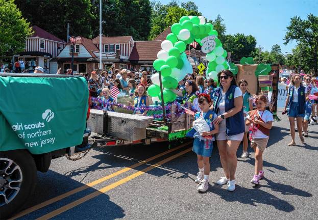 Sparta. Fourth of July events Girl Scouts take part in the parade.