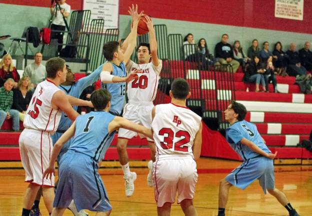 High Point's Will Mason in the midst of a shot in the fourth period.