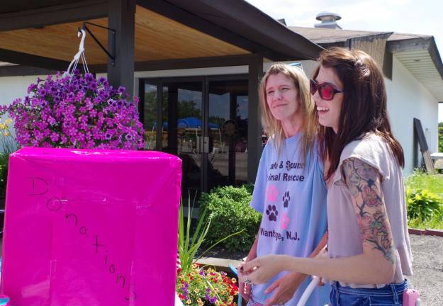 Safe and Sound Animal Rescue co-owners Karyn Pirl and her daughter Ashley Adam of Wantage-based Safe &amp; Sound Animal Rescue greeted visitors as they entered the Sussex Elks Lodge.