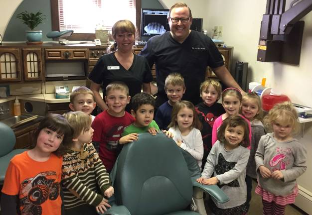 Dr. Eric Achtau and his Dental Assistant, Evonne with the students from Sussex Wantage Preschool.