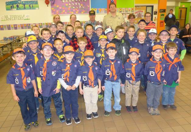 Cub Scouts and leaders of Vernon's Pack 183, as well as Tom Gundlach of the VFW.