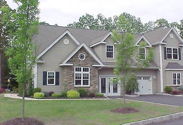 Enjoy maintenance-free living and river views in a modern townhome Enjoy maintenance-free living and river views in a modern townhome